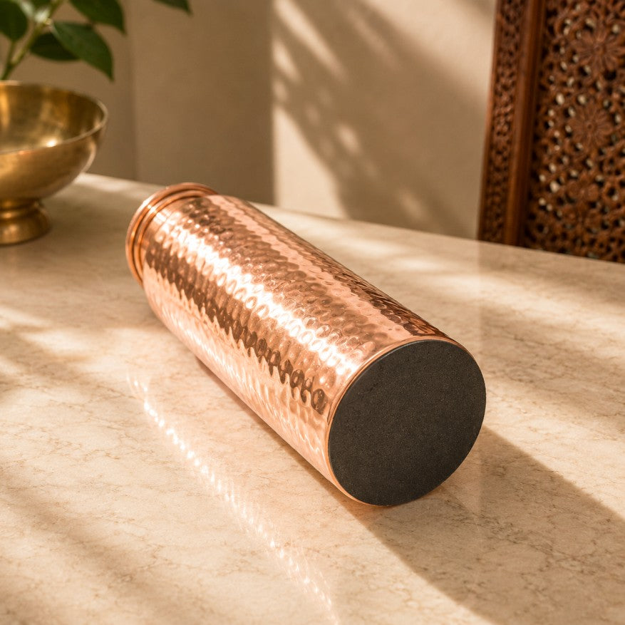 Handcrafted hammered pure copper water bottle with leakproof copper screw cap, made in India by Pitalya