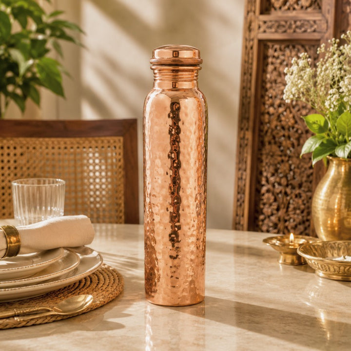 Handcrafted hammered pure copper water bottle with leakproof copper screw cap, made in India by Pitalya
