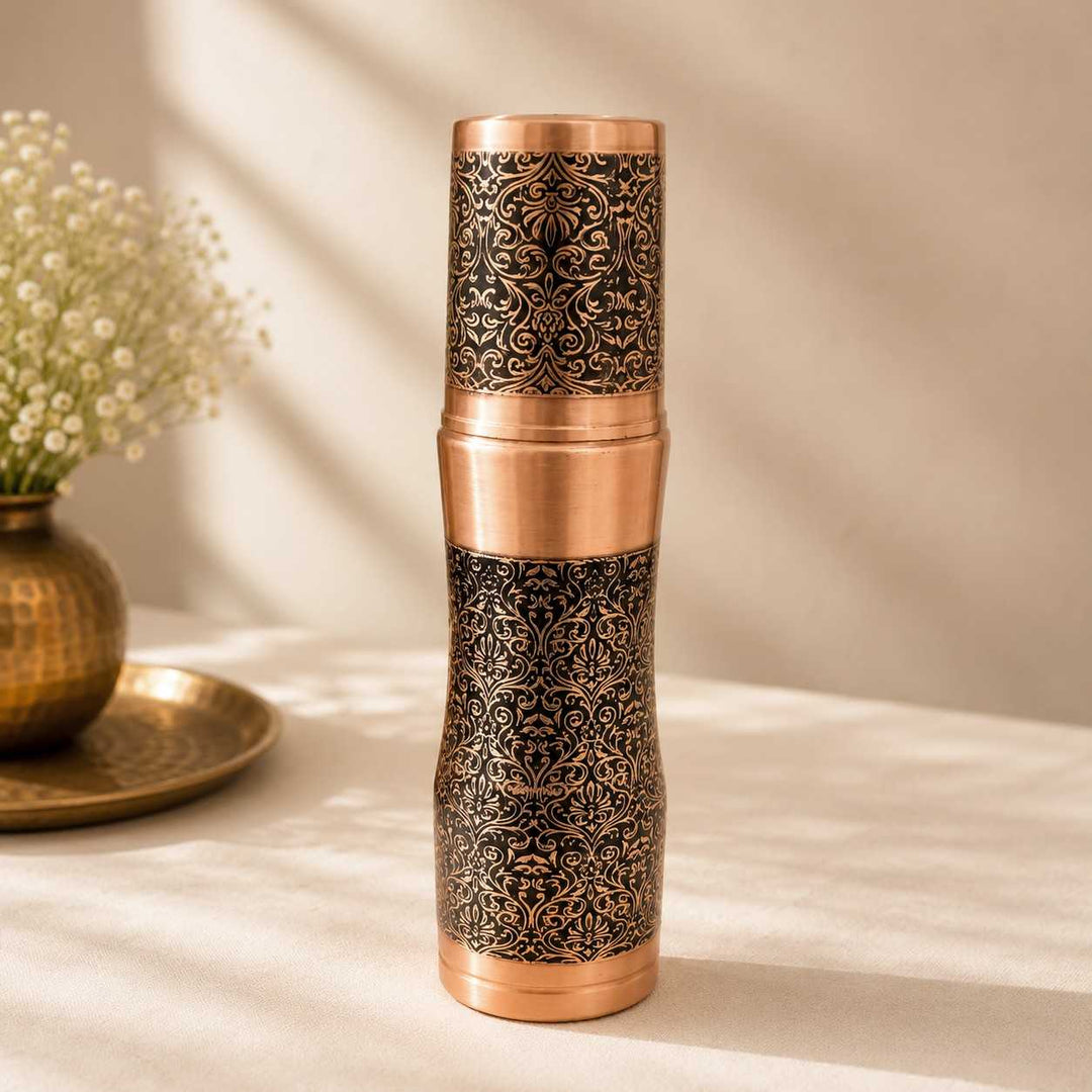 Handcrafted Pure Copper Water Bottle with Intricate Engraved Pattern and Matching Copper Tumbler