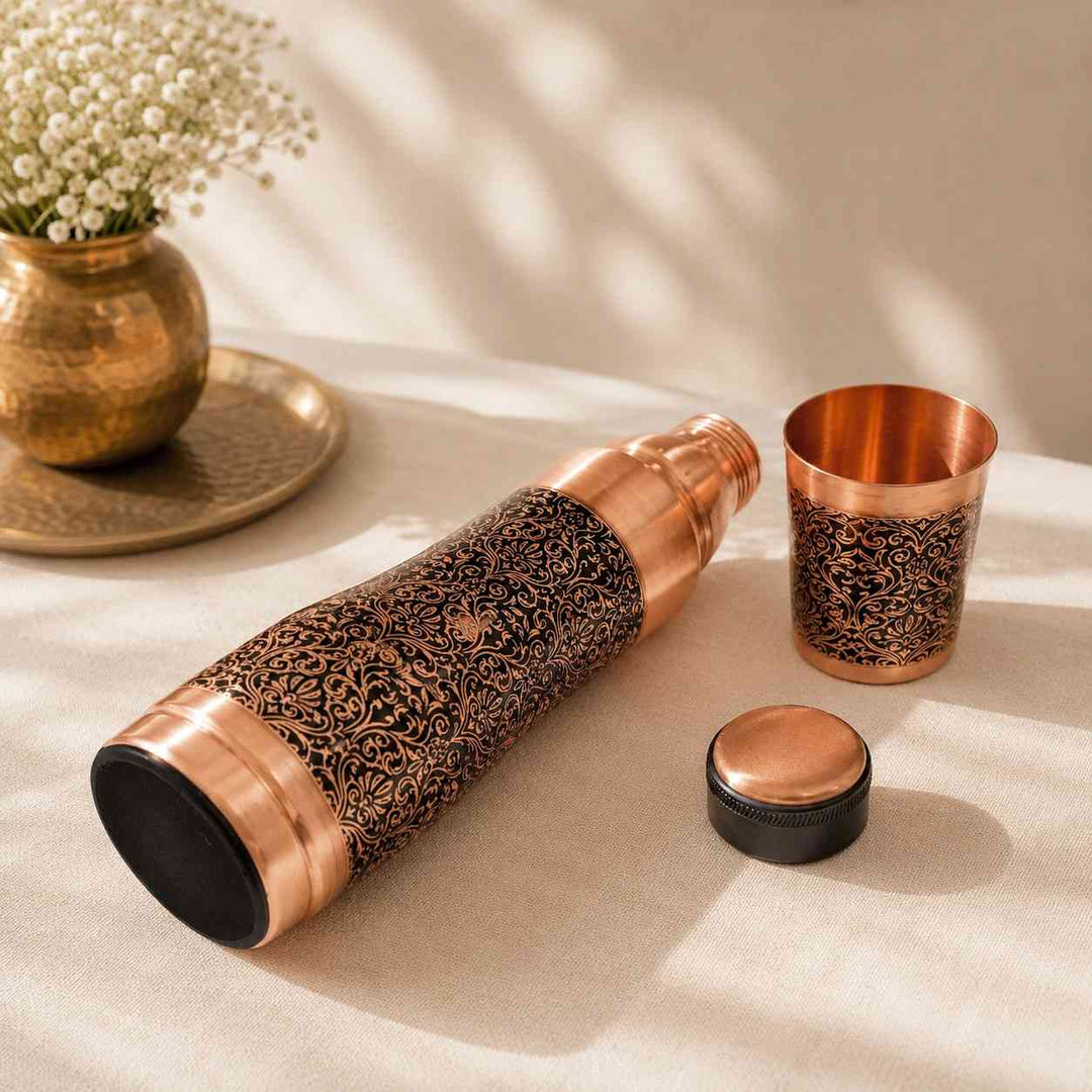 Handcrafted Pure Copper Water Bottle with Intricate Engraved Pattern and Matching Copper Tumbler