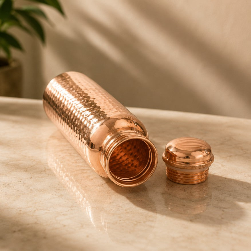 Handcrafted hammered pure copper water bottle with leakproof copper screw cap, made in India by Pitalya